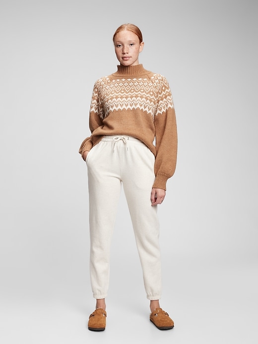 1 of 8 showing, with the color tan camel of product Cozy Fair Isle Sweater