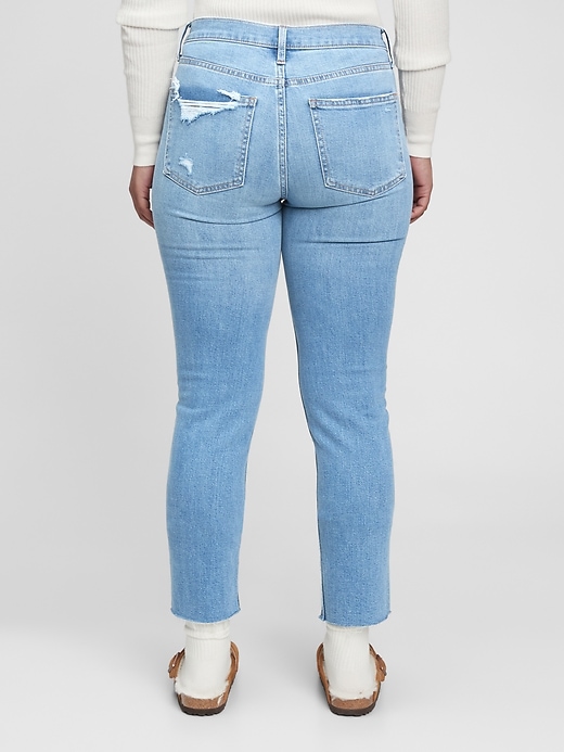 2 of 8 showing, with the color light indigo of product Mid Rise Vintage Slim Jeans with Washwell