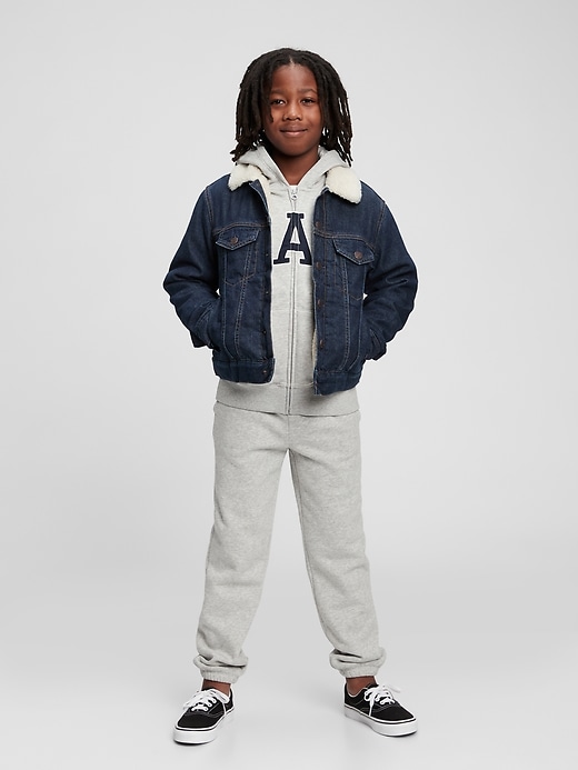 2 of 8 showing, with the color medium wash of product Kids Sherpa Lined Denim Jacket