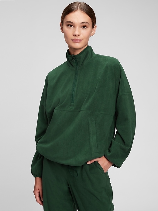 1 of 8 showing, with the color emerald green of product GapFit Reversible Recycled Half-Zip Windbreaker