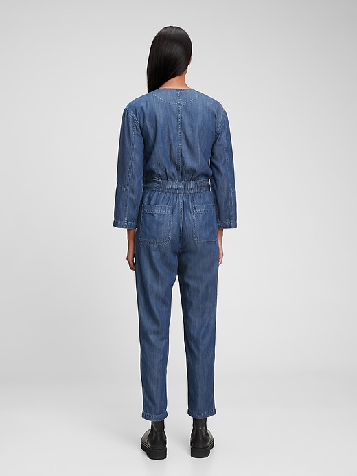 2 of 8 showing, with the color dark indigo of product Tencel Modal™ Denim V-Neck Jumpsuit