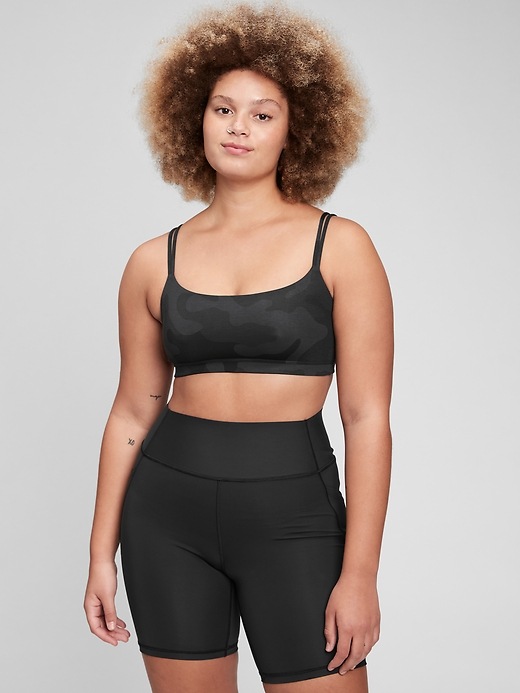 1 of 8 showing, with the color black camo of product GapFit Breathe Low Support Strappy Sports Bra