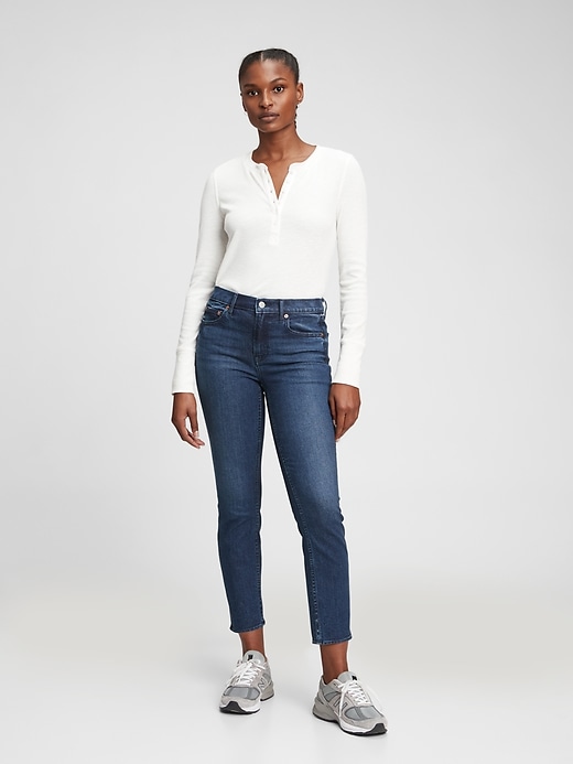 1 of 8 showing, with the color rinsed of product Mid Rise Vintage Slim Jeans