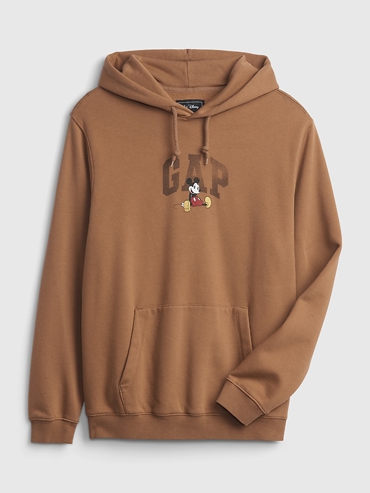 1 of 8 showing, with the color maple sugar beige of product Adult Gap x Disney Logo Hoodie