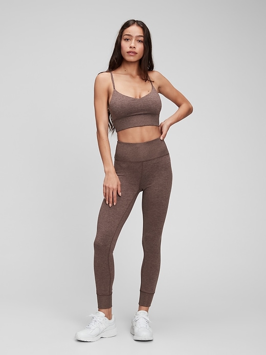1 of 8 showing, with the color dried fig brown of product GapFit Brushed Tech Jersey Leggings