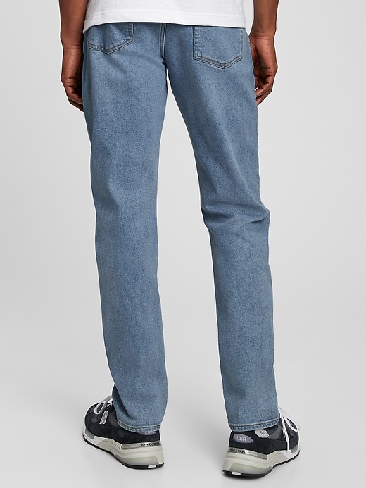 2 of 8 showing, with the color light wash of product 365Temp Performance Slim Jeans in GapFlex with Washwell