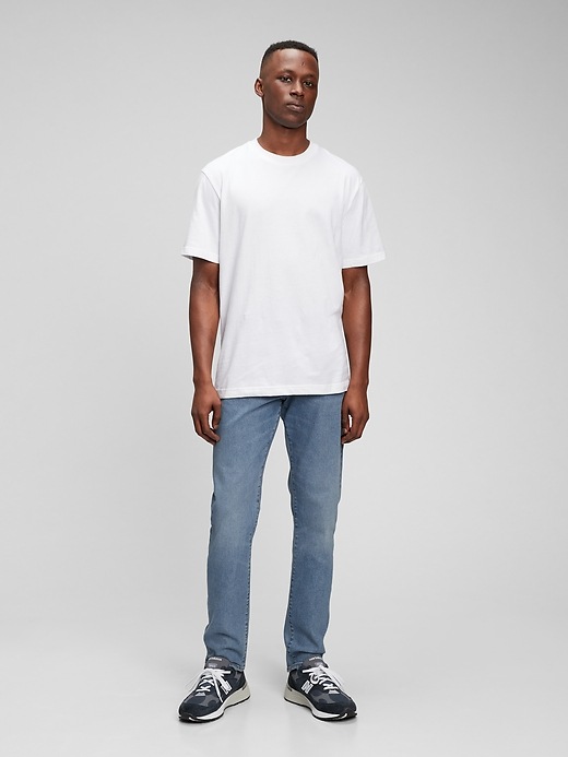 1 of 8 showing, with the color light wash of product 365Temp Performance Slim Jeans in GapFlex with Washwell
