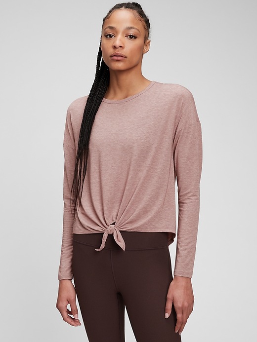 1 of 8 showing, with the color fig pink of product GapFit Breathe Hi-Low Tie Front Top