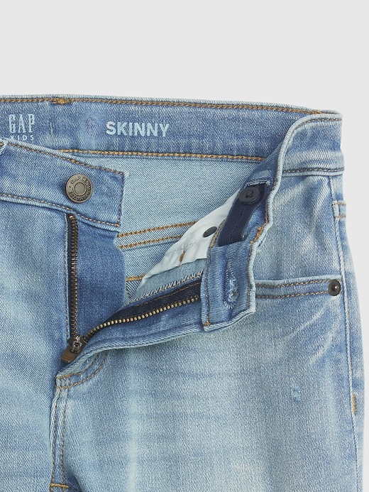 Image number 4 showing, Kids Distressed Skinny Jeans with Washwell