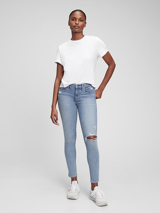 Image number 1 showing, Mid Rise True Skinny Jeans with Washwell