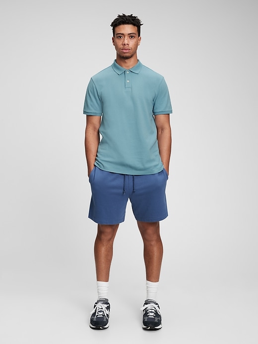1 of 8 showing, with the color blue brook of product All Day Pique Polo Shirt
