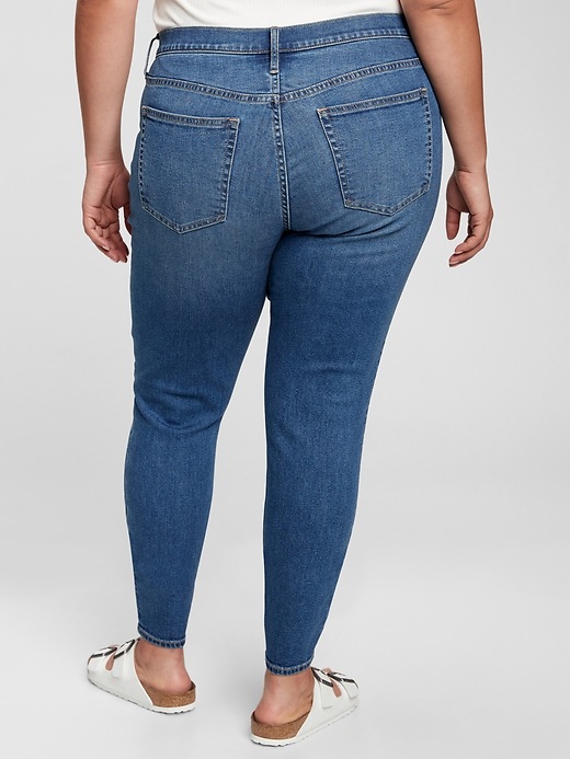 Image number 5 showing, Mid Rise True Skinny Jeans with Washwell