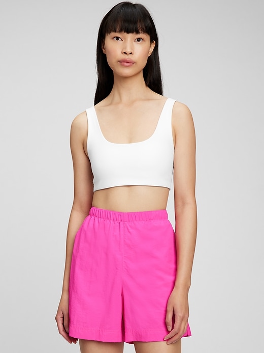 1 of 8 showing, with the color optic white of product GapFit Low Impact Power Scoopneck Sports Bra