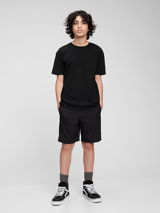 1 of 8 showing, with the color true black of product Teen Quick-Dry Shorts