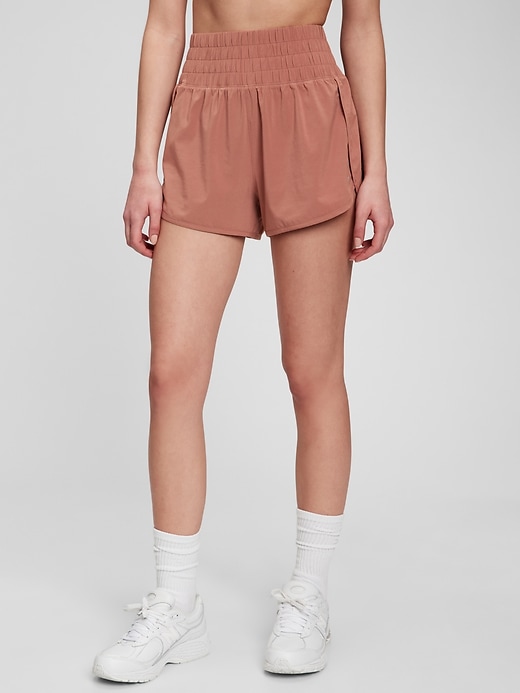 1 of 8 showing, with the color mauvey brown of product GapFit High Rise Running Shorts