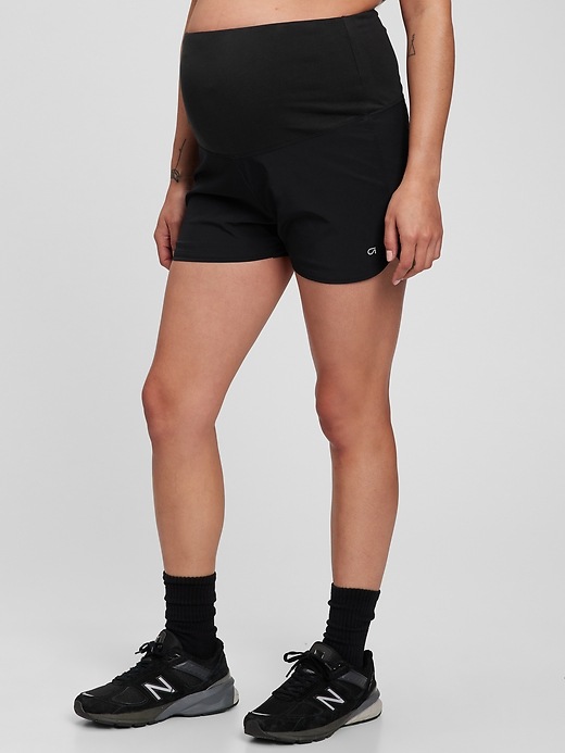 1 of 8 showing, with the color true black of product GapFit Maternity Full Panel 3.5" Running Shorts