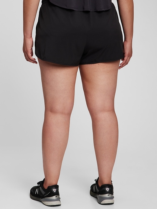 2 of 8 showing, with the color true black of product GapFit Running Shorts