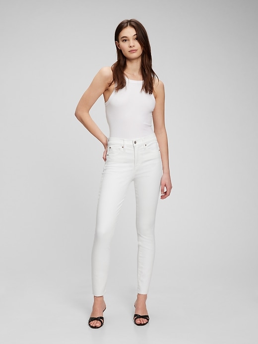 1 of 8 showing, with the color optic white of product High Rise True Skinny Jeans with Washwell