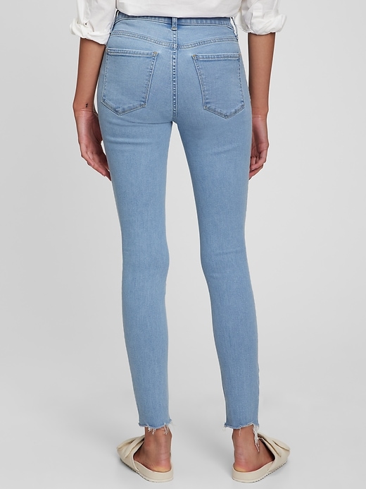 2 of 8 showing, with the color light blue destroy of product Mid Rise Universal Jegging