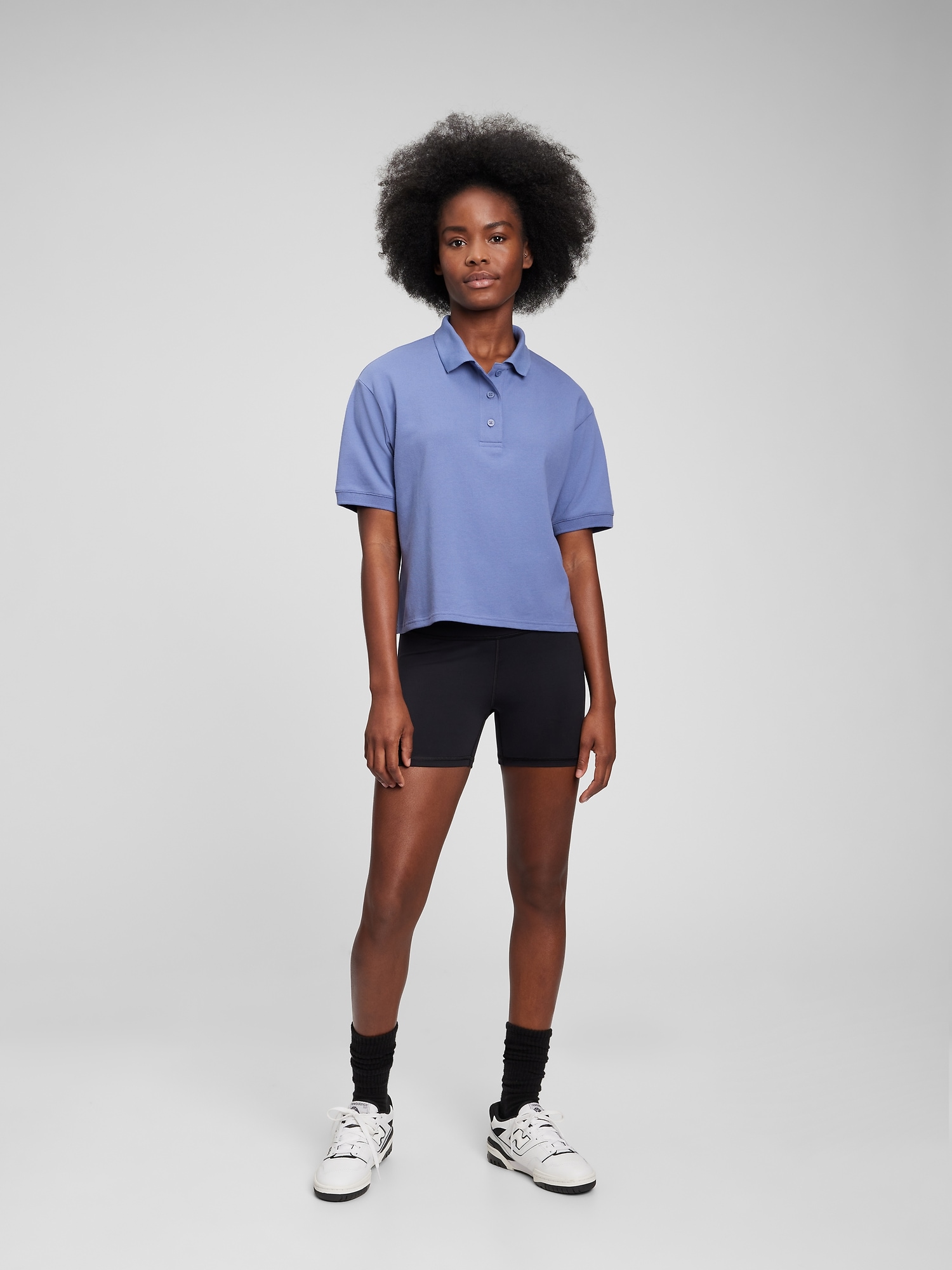 Black cropped polo online shirt