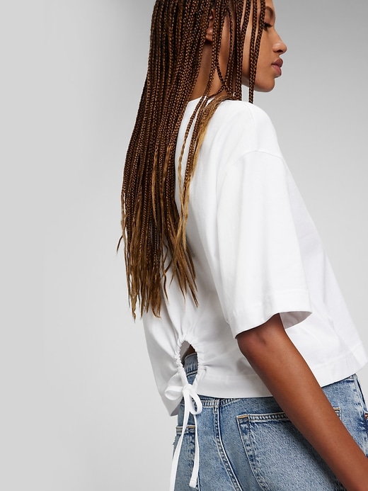 1 of 8 showing, with the color optic white of product Boxy Cropped Tie-Back T-Shirt