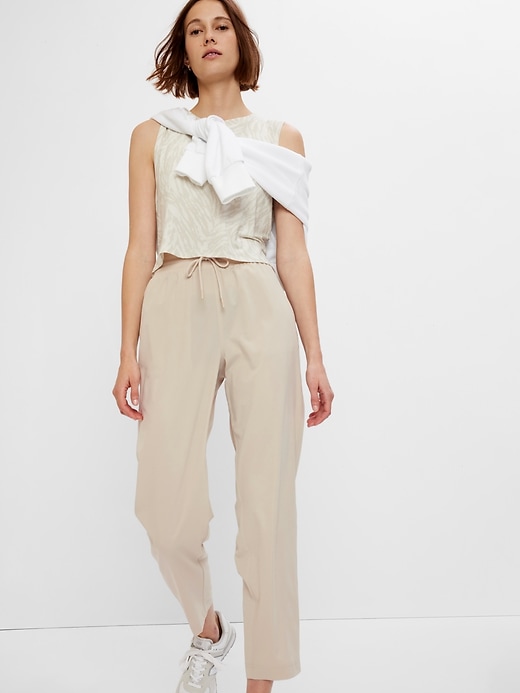 View large product image 1 of 12. GapFit High Rise Runaround Pants