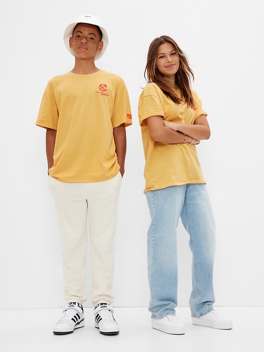 1 of 8 showing, with the color french almond of product Gap × Stranger Things Teen Graphic T-Shirt