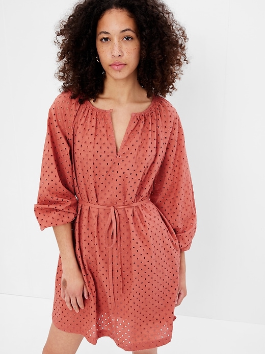 1 of 8 showing, with the color cedarwood brown of product Eyelet Mini Dress