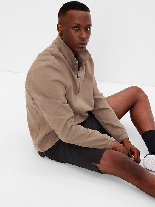 1 of 8 showing, with the color cocoa brown of product GapFit Tech Fleece Half-Zip Pullover