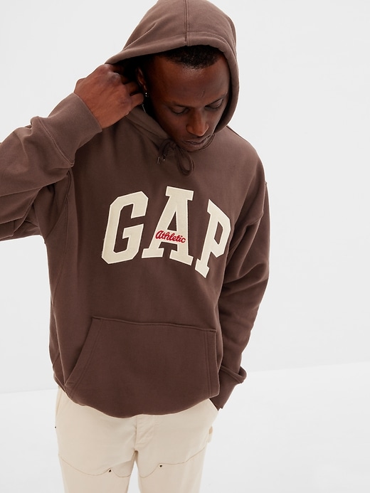 1 of 8 showing, with the color WOODSY BROWN of product Organic Cotton Archive Gap Arch Logo Hoodie