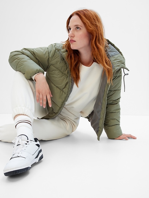 1 of 8 showing, with the color vintage flight green of product Lightweight Puff Jacket