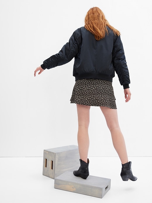 2 of 8 showing, with the color black ditsy floral of product LENZING™ ECOVERO™ Wrap Mini Skirt