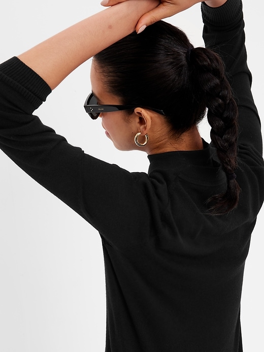 2 of 8 showing, with the color true black of product Merino Long Cardigan