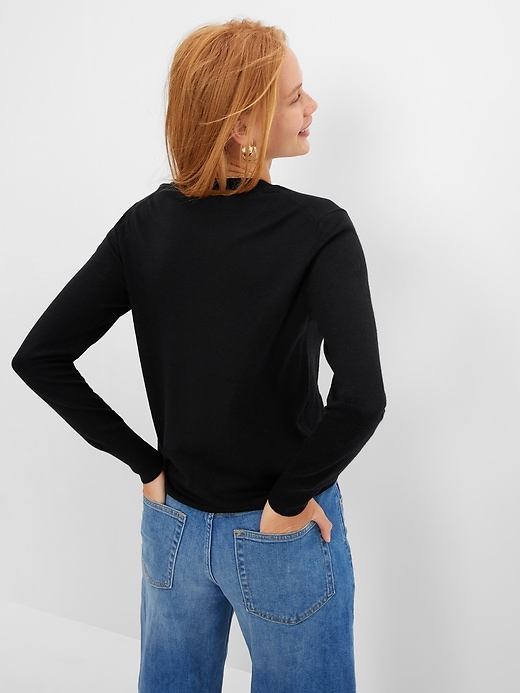 2 of 8 showing, with the color true black of product Merino Crewneck Sweater