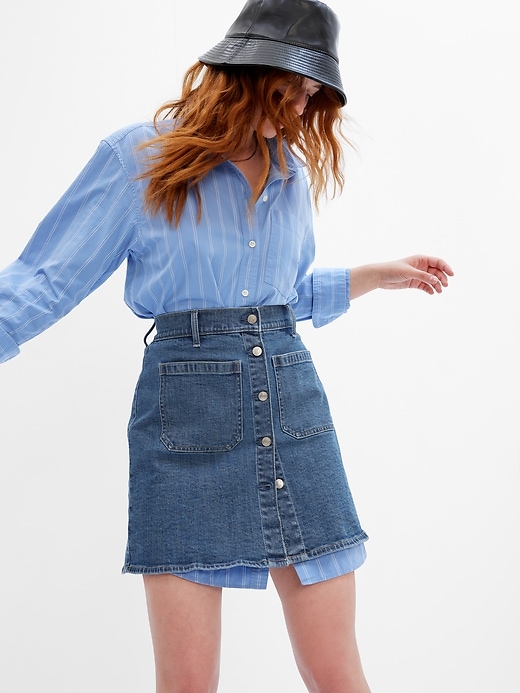 1 of 8 showing, with the color medium wash of product Patch Pocket Denim Mini Skirt