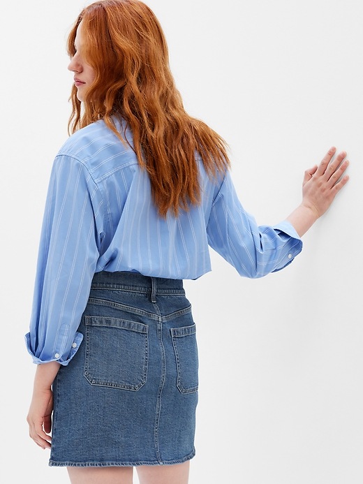 2 of 8 showing, with the color medium wash of product Patch Pocket Denim Mini Skirt
