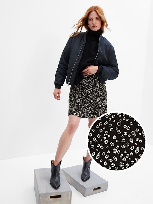 1 of 8 showing, with the color black ditsy floral of product LENZING™ ECOVERO™ Wrap Mini Skirt