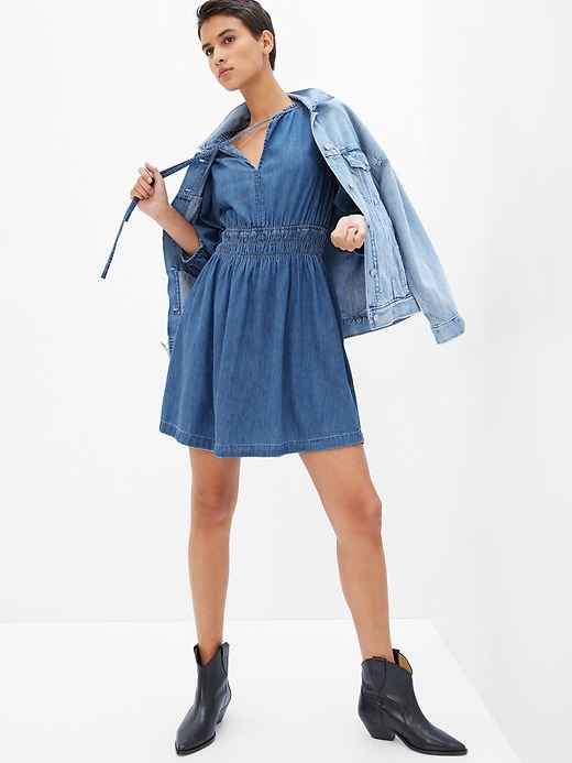 1 of 8 showing, with the color medium wash of product 100% Organic Cotton Denim Puff Mini Dress with Washwell