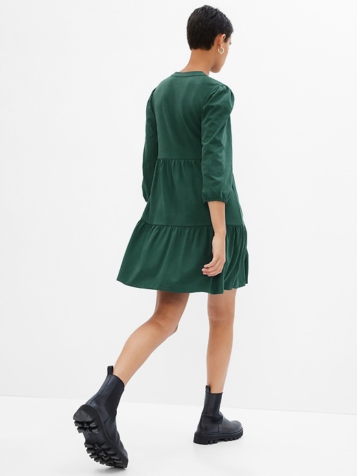 2 of 8 showing, with the color june bug green of product Puff Tiered Mini Dress