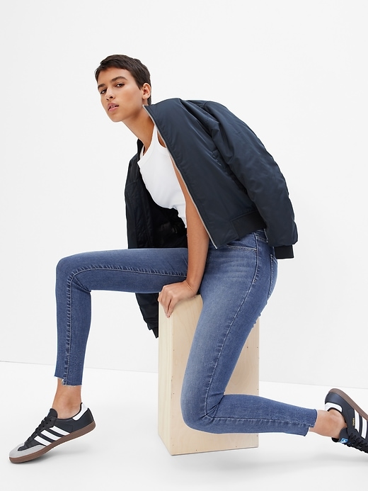 1 of 8 showing, with the color medium wash of product Mid Rise Universal Jeggings