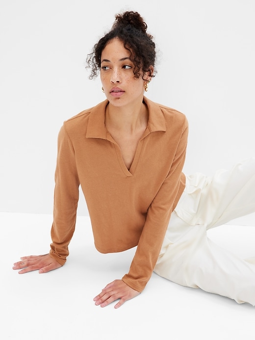 1 of 8 showing, with the color holiday brown of product Cropped V-Neck Polo Shirt