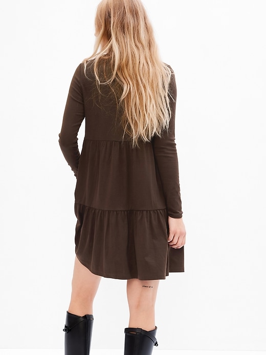 2 of 8 showing, with the color brown noir of product Modern Mockneck Tiered Mini Dress