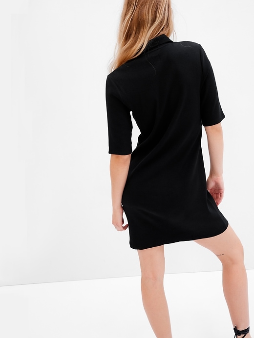 2 of 8 showing, with the color black of product Button-Up Mini Dress