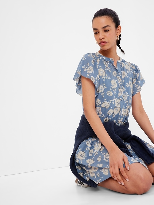 1 of 8 showing, with the color blue floral of product Button-Front Flutter Sleeve Mini Dress