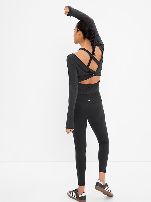 2 of 8 showing, with the color true black of product GapFit Breathe Open Back Twist T-Shirt