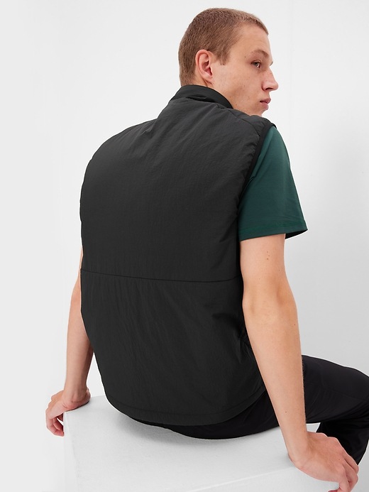 2 of 8 showing, with the color true black of product GapFit Primaloft Vest