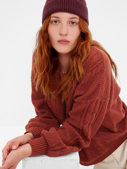 1 of 8 showing, with the color burnt russet red of product Cable-Knit Sweater