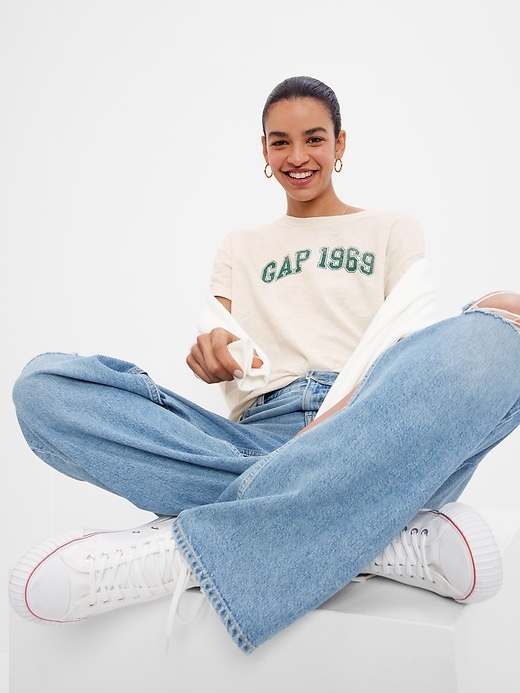 1 of 8 showing, with the color birch beige of product 100% Organic Cotton Gap 1969 Logo T-Shirt