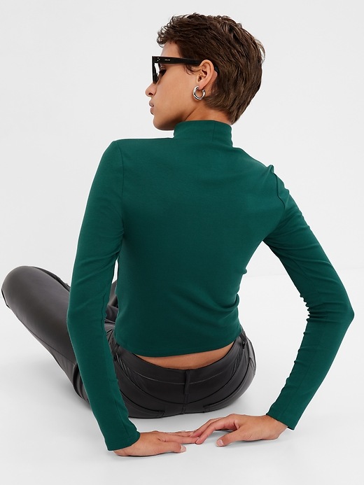 2 of 8 showing, with the color june bug green of product Modern Cropped Mockneck Top