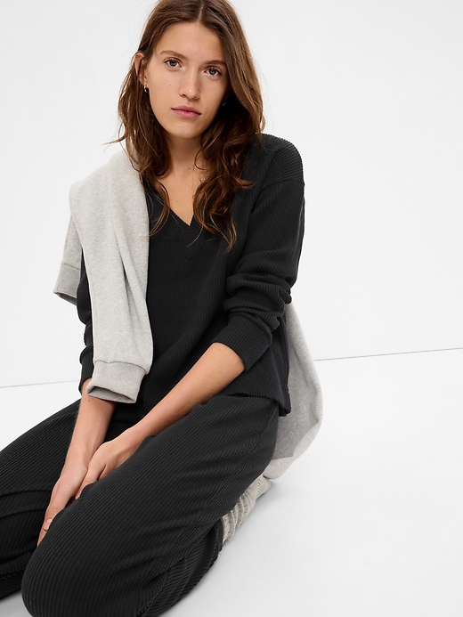1 of 8 showing, with the color true black of product Cozy Rib Top